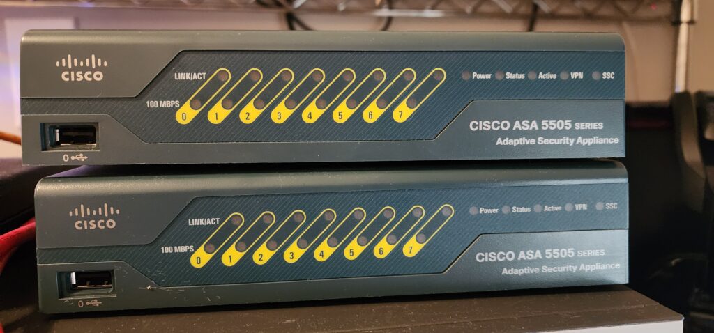 A picture of two Cisco ASAs