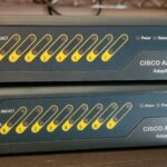 A picture of two Cisco ASAs